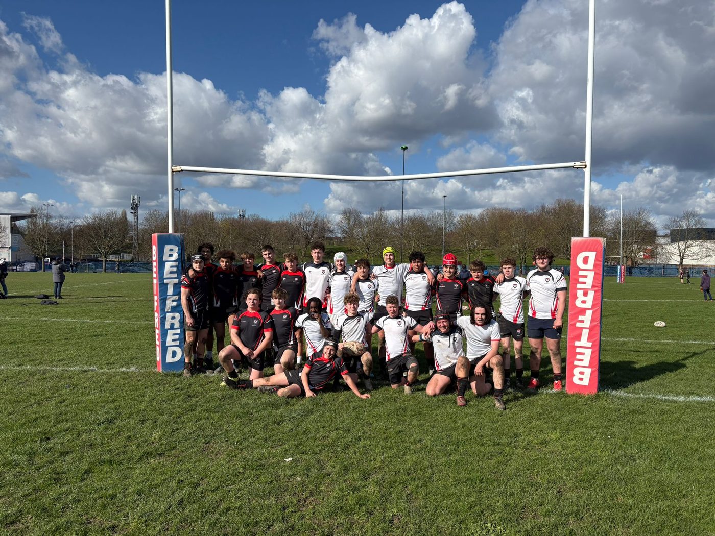 U17 Boys team photo under the posts at New River Sports Complex